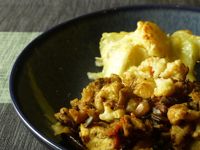 Aubergines stuffed with stir-fried cauliflower and potato gratin